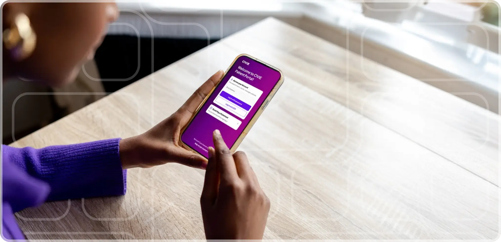 A person using a smartphone to log in to a digital patient portal application.